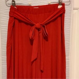 Red Maxi Jumpsuit with Tie Front and Pleated A-Line Style